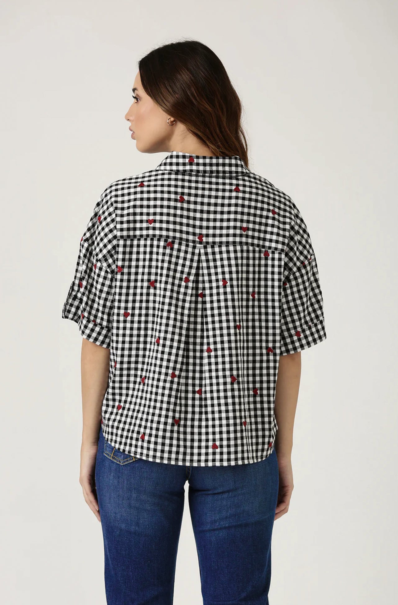 GINGHAM HEART EMBROIDERED SHIRT Classic checks? They just got a stylish upgrade. This shirt is all about fresh vibes and fun, made for the modern woman who knows how to make a statement.
