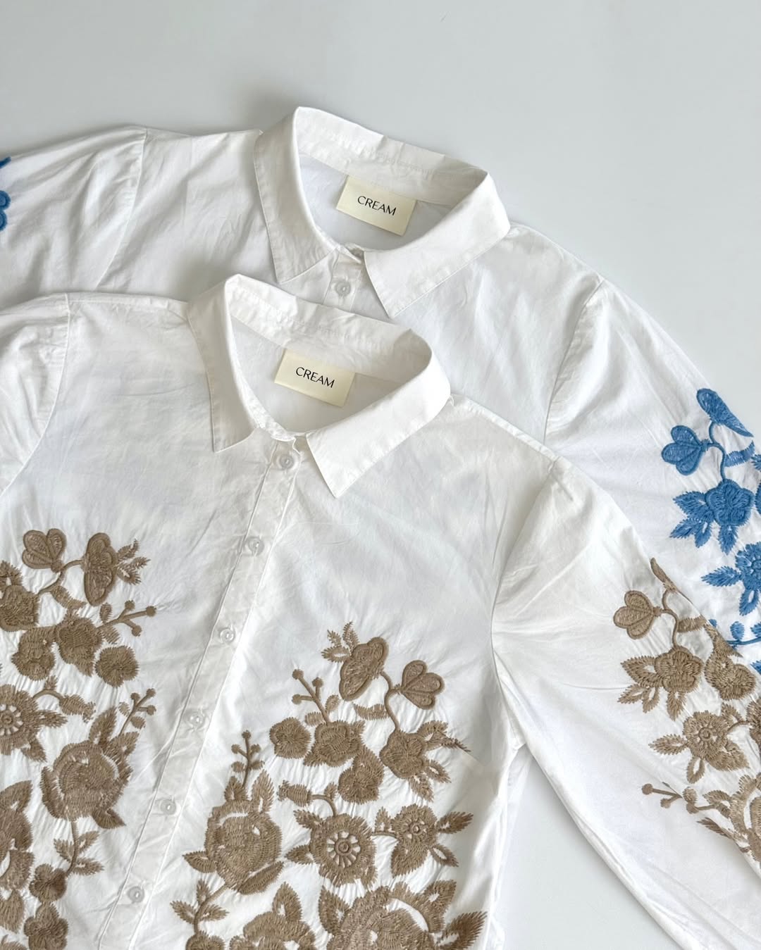 “Women’s White Button-Down Shirt with Blue Floral Embroidery – Casual Long Sleeve Top”