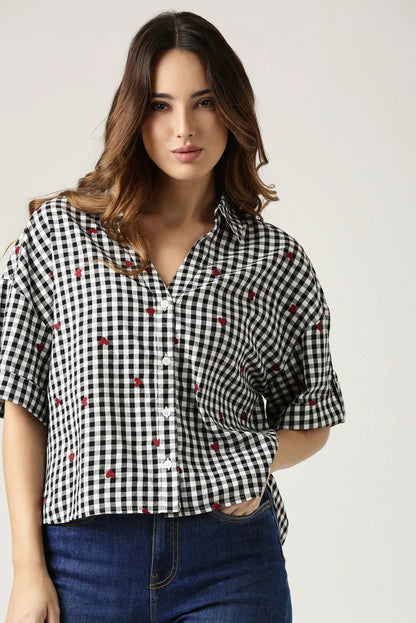 GINGHAM HEART EMBROIDERED SHIRT Classic checks? They just got a stylish upgrade. This shirt is all about fresh vibes and fun, made for the modern woman who knows how to make a statement.