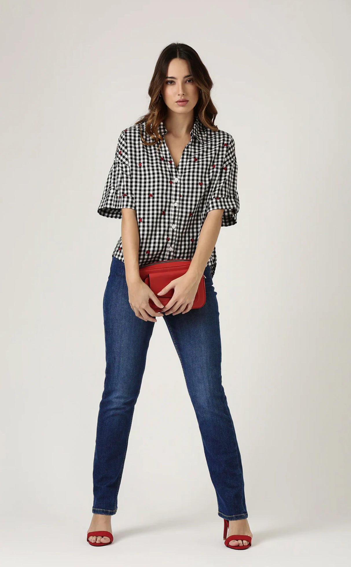 GINGHAM HEART EMBROIDERED SHIRT Classic checks? They just got a stylish upgrade. This shirt is all about fresh vibes and fun, made for the modern woman who knows how to make a statement.